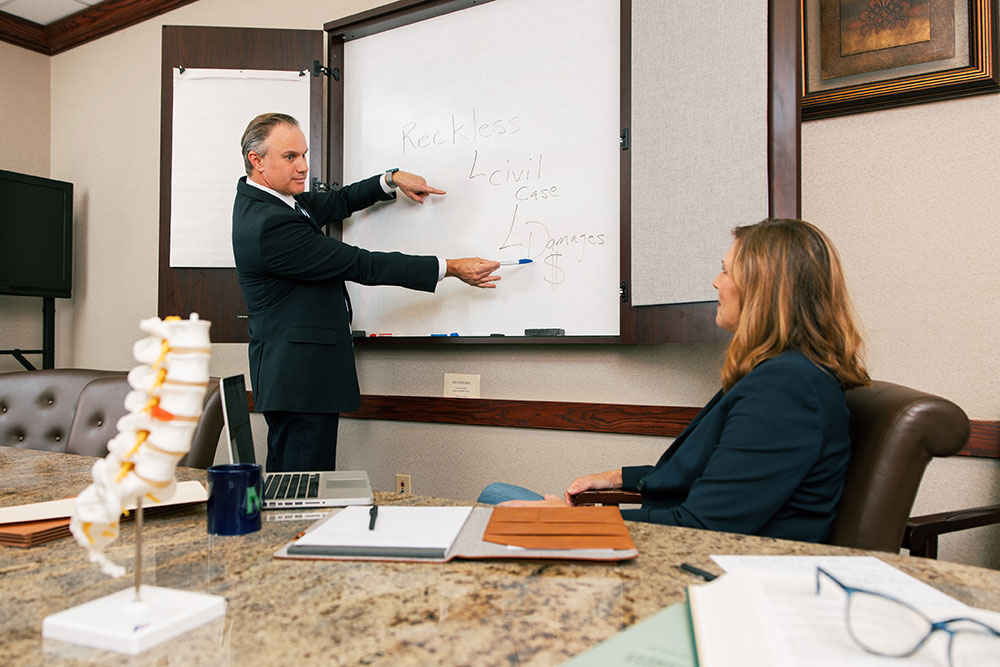 Image of attorneys at Mahoney Law, PLLC during discussion